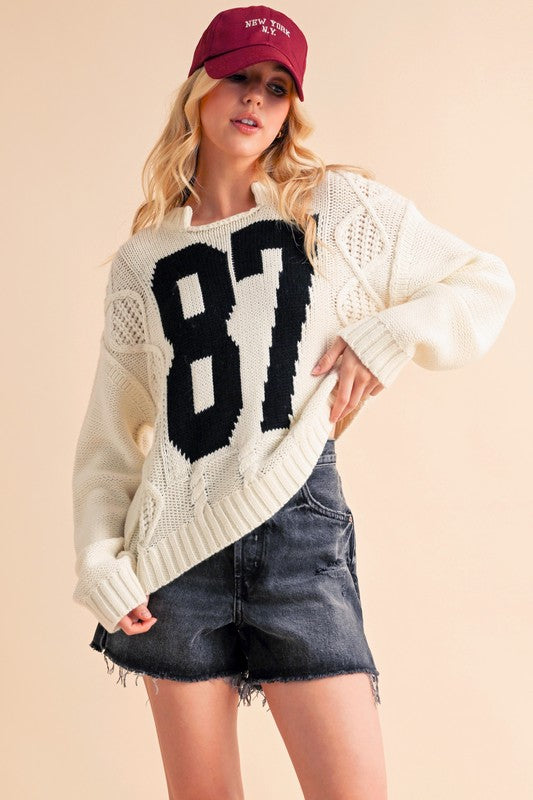 Aemi+Co Contrast Number Cable Knit Drop Shoulder Sweater